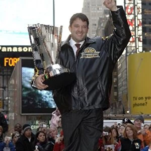Nextel Cup Series: Tony Stewart poses with the trophy in Times Square