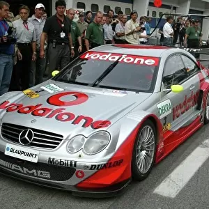 Niki Lauda (AUT), former Formula One driver, in the the Mercedes CLK two-seater DTM car. DTM Championship, Rd 8, A1-Ring, Austria. 06 September 2003. DIGITAL IMAGE