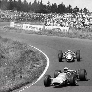 Nurburgring, Germany. 6 August 1967: Jo Schlesser, Matra MS5-Cosworth, F2 class, leads Jackie Oliver, Lotus 48-Cosworth, F2 class, action
