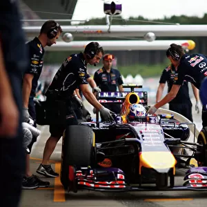 Red Bull Ring, Spielberg, Austria. Saturday 21 June 2014. Daniel Ricciardo, Red Bull Racing RB10 Renault, in the pit lane. World Copyright: Charles Coates/LAT Photographic. ref: Digital Image _N7T1896