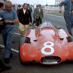 Reims, France. 29th June - 1st July: A Streamline Maserati 250F is prepared in the pits