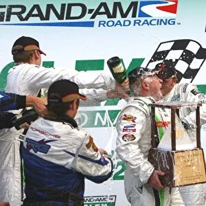 Rolex 24 at Daytona: RJ Valentine is doused with champagne by his TRG teammates following their GT class win