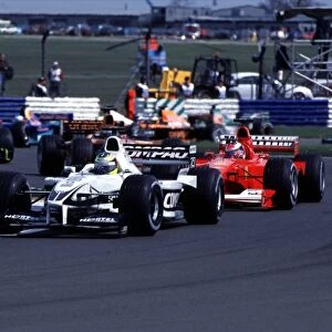 Silverstone, England. 21st - 23rd April 2000: Ralf Schumacher leads his brother Michael at the start of the race