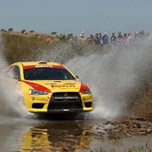 World Rally Championship: Jarkko Nikara Mitsubishi Evo X on stage 9