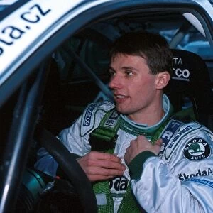 World Rally Championship: Roman Kresta was to have a lucky escape when he crashed his Skoda Octavia WRC; a telegraph pole halting his fall down
