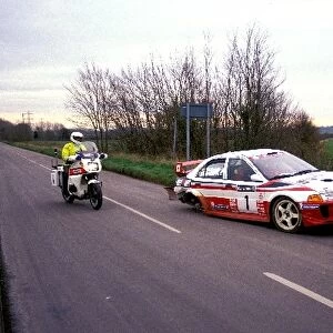 World Rally Championship: Tommi Makinen Mitsubishi Lancer is pulled over by the British Police for running on the road with only three wheels