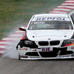 World Touring Car Championship: Jorg Muller BMW 320si with race one damage