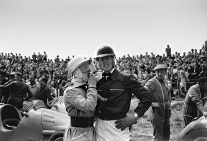 Images Dated 29th June 2010: 1953 Dutch Grand Prix: Stirling Moss, 9th position, talks to Mike Hawthorn, 4th position