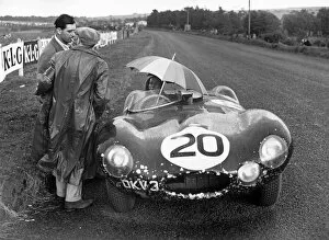 1954 Tourist Trophy: Stirling Moss / Peter Walker, 18th position, waiting in the rain, portrait