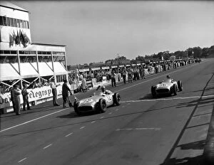 Chequered Gallery: 1955 British Grand Prix: Stirling Moss leads Juan Manuel Fangio in 1st