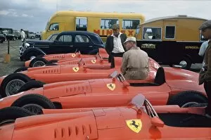 Images Dated 11th February 2011: 1956 British Grand Prix: All four Lancia Ferrari D50s in the paddock, atmosphere