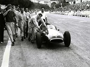 Images Dated 23rd July 2003: 1957 Monaco Grand Prix: Jack Brabham pushes his Coper across the finish line