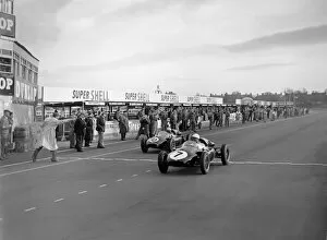 Jack Brabham (2nd April 1926 - 19th May 2014) Collection: 1958 Aintree 200: Stirling Moss, 1st position, beats Jack Brabham, 2nd position