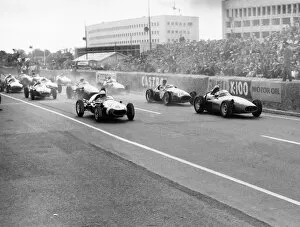 Images Dated 7th July 2011: 1958 Caen Grand Prix: Stirling Moss, 1st position, leads Jean Behra, retired, at the start, action