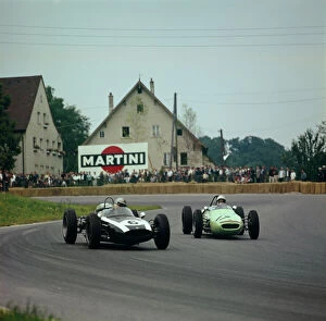 Allmyraces Gallery: 1961 Solitude Grand Prix: Stirling Moss, retired, chases Jack Brabham, 5th position, action