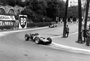 1960s F1 Collection: 1962_17: Graham Hill leads Jim Clark into the Old Station Hairpin. Hill finished in 6th position
