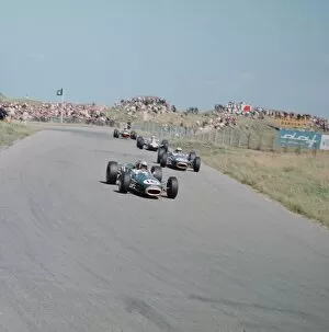 Images Dated 29th January 2010: 1966 Dutch Grand Prix: Jack Brabham leads Denny Hulme and Jim Clark