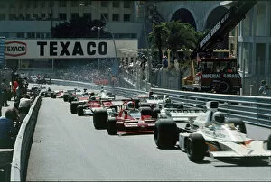 Partingshot Gallery: 1973 Monaco Grand Prix: Denny Hulme 6th position, leads Chris Amon, retired