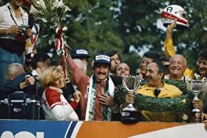 Images Dated 8th June 2011: 1975 Italian Grand Prix - Podium: Clay Regazzoni, 1st position, celebrates on the podium, portrait