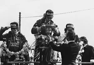 1977 British Grand Prix: James Hunt, 1st position, receives his winners trophy from HRH Prince Michael of Kent with