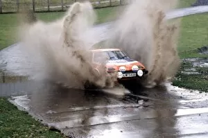 Images Dated 13th October 2004: 1978 FIA World Rally Championship: Tony Pond / Fred Gallagher speed through a water plash in their