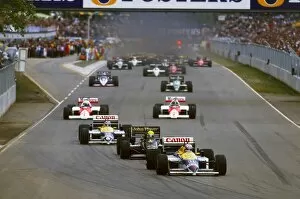 1986 Australian Grand Prix - Nigel Mansell: Nigel Mansell, retired, leads the field on the warm up lap. Action