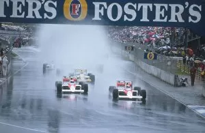 1980s F1 Gallery: 1989 Australian Grand Prix: Ayrton Senna leads teammate Alain Prost with Pierluigi Martini behind in the spray at the start