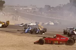 Images Dated 12th February 2010: 1989 French Grand Prix: The aftermath of Mauricio Gugelmins huge crash on the start of the race at