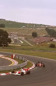 Images Dated 12th February 2010: 1989 Hungerian Grand Prix: Ayrton Senna leads Nigel Mansell