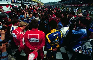 1995 SAN MARINO GP. The drivers stand on the grid, in remembrance