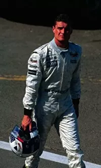 Images Dated 24th April 2021: 1997 HUNAGARIAN GP. David Coulthard retires at the Hungaroring. Photo: LAT / Tee