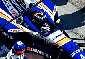 Images Dated 20th May 2021: 1997 HUNGARIAN GP. Heinz Harald Frentzen retires from the race in the pits with a