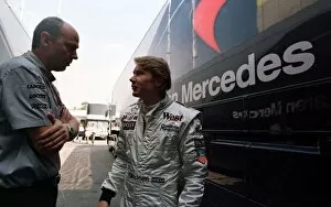 Images Dated 26th April 2021: 1997 SPANISH GP. McLaren Mercedes driver MIka Hakkinen chats to his head engineer