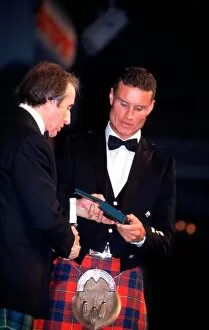 Images Dated 5th December 2001: 2001 Autosport Awards Jackie Stewart and David Coulthard Grosvenor House, London