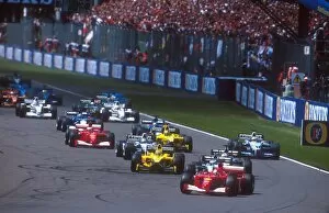 Images Dated 9th October 2013: 2001 British Grand Prix: Michael Schumacher leads Mika Hakkinen, David Coulthard, Jarno Trulli