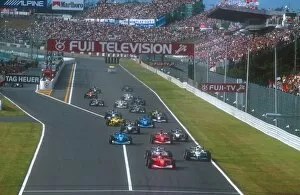Images Dated 9th October 2013: 2001 Japanese Grand Prix: Michael Schumacher leads Juan-Pablo Montoya, Ralf Schumacher