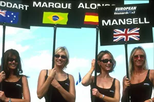2001 Minardi F1 Two Seater Race. Donington, England. 21st August 2001. Grid girls for the 4 drivers, Stoddarrt, Marques