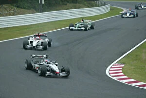 Images Dated 12th October 2003: 2003 Japanese Grand Prix - Sunday Race, Suzuka, Japan. 12th October 2003. Kimi Raikkonen
