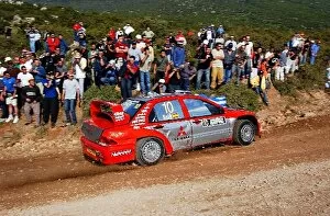 Images Dated 5th June 2004: 2004 FIA World Rally Championship: Daniel Sola, Mitsubishi Lancer WRC 04, in action on Stage 10