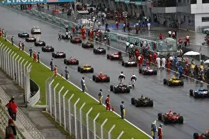 Images Dated 5th April 2009: 2009 GP2 Asia Series. Round 5: The GP2 Asia cars on the grid before the start of the race. Action