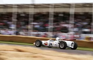 Images Dated 1st July 2011: 2011 Goodwood Festival of Speed: Lola T90 driven by Graham Hill to win the Indy 500 in 1966. Action