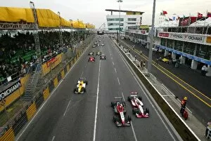 Images Dated 16th November 2003: 50th Macau Grand Prix: Ryan Briscoe Prema Powerteam and Fabio Carbone Signature battle at