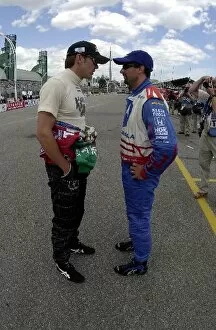 Adrian Fernandez and Michael Andretti compare notes before qualifying for the Molson Indy Toronto