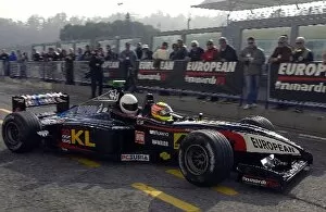 Images Dated 27th October 2002: Annual Minardi Day Celebration: Alex Yoong takes a fan out in the Minardi F1x2 2-seater