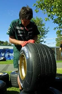 Images Dated 5th March 2001: Australian GP: A Jaguar mechanic checks the Michelin tyres
