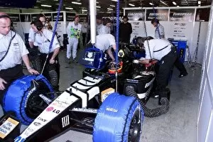 Images Dated 3rd March 2001: Australian Grand Prix: Fernando Alsonso European Minardi PS01 prepares for his first practice as a