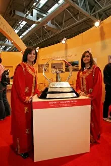 Images Dated 15th January 2005: Autosport International Show: Bahrain GP hostesses with the trophy for best promoted GP of 2004