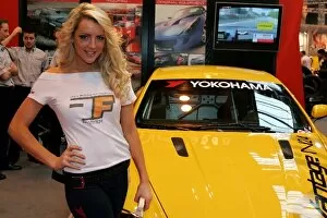Images Dated 13th January 2007: Autosport International Show: A Promo girl with the Aston Martin V8 Vantage Nurburgring 24 Hours car
