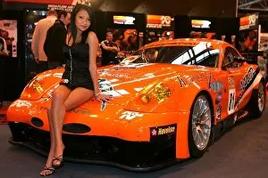 Images Dated 13th January 2007: Autosport International Show: A promo girl sits on the Team LNT Panoz Esperante GTLM