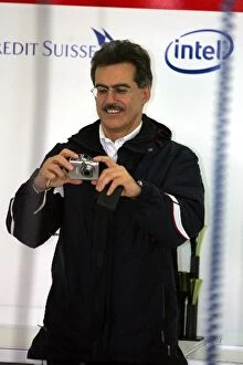 Images Dated 16th January 2007: BMW Sauber F1.07 First Run: Dr Mario Theissen BMW Sauber F1 Team Principal uses a camera